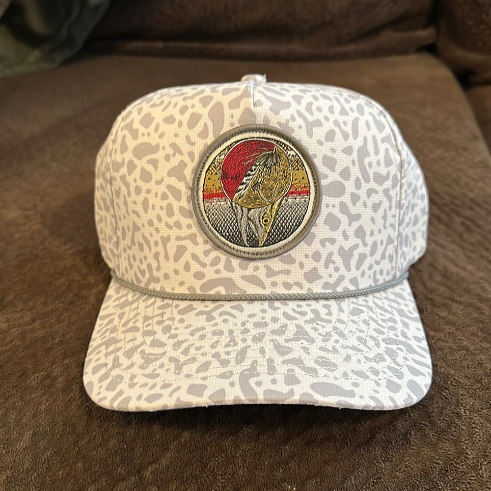 Salmon embroidery patch snap back. Size fits all